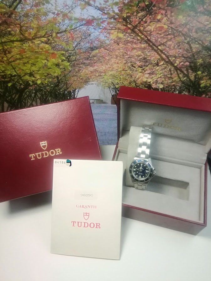 a tudor ladies sub blue dial with paper and box, more information
